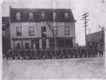 Group portrait of WWI soldiers in front of the Alexandra Hotel, Colborne