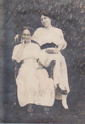 Two women seated in a chair