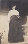 Woman standing on a porch