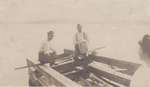 Three men building a dock