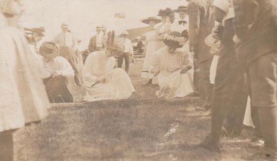 Postcard of ladies participating in a nail driving competition, Colborne Fair