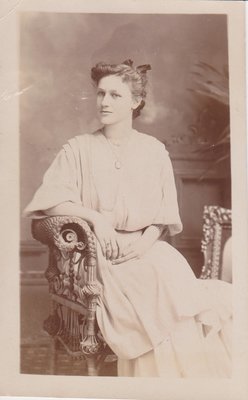 Postcard of young woman, studio portrait