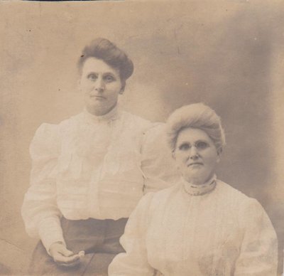 Postcard of mother and daughter, studio portrait