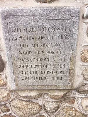 Inscription on the granite plaque mounted on the military memorial cairn on the front lawn of Royal Canadian Legion Branch 187, located at  97 King Street East, Colborne, looking south, October 2017