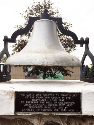 Bell and plaque on the military memorial cairn, Royal Canadian Legion Branch 187, Colborne, detail