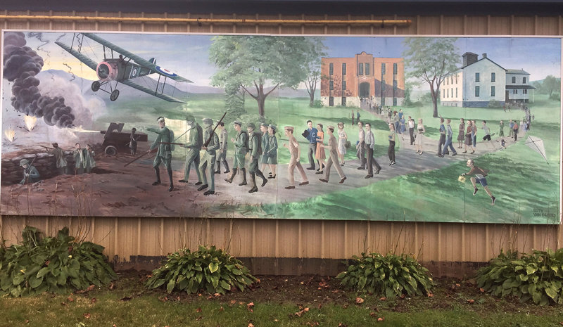 Royal Canadian Legion mural by Ruth Van Egmond, located at  97 King Street East, Colborne