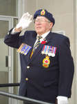 Don Prentice, sole WWII vet taking the salute from the passing Remembrance Day parade, Colborne, November 11, 2011