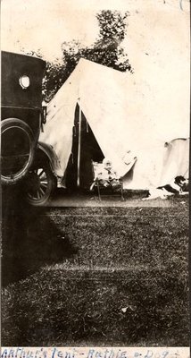 Ruth Turpin and family dog at Arthur's tent, Turpin Family Photograph Album