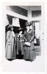 Photograph of three unidentified women standing in front of Colborne storefront, 1910s, Colborne Women's Institute Scrapbook