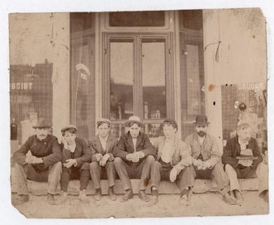 Photograph of Sergeant Major Willoughby, Non-Com Coxall, Corp. Arthur Griffis, Marker Chas. P. Brown, Cap. Willie Neil, Vocalist B. Morton Jones and Thos. I Bailey - 5 July 1898, Women's Institute Scrapbook