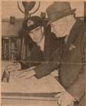 Newspaper photograph of Capt. James H. Peacock and Capt. William Turner, R.C.N., H.M.C.S. Port Hope, Colborne Women's Institute Scrapbook