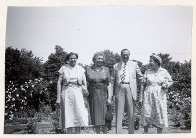 Photograph of Mrs. Myles, Mrs. McLaughlin, Dr. Robertson and Mrs. Maude Kirk, July 1955 trip to Ottawa, Colborne Women's Institute Scrapbook