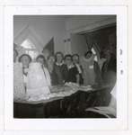 Photograph of Ellen MacGregor, Grace Corbyn, Margaret Mackie, Maggie Mackie, Amy Gresham, Goldie Cox, Flossie Pebbles,  Hattie McLaughlin and Marjorie Rutherford, Colborne Women's Institute Scrapbook