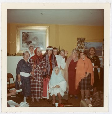 Photograph of Maggie Mackie, Jean Savage, Kate Thompson, Ellen MacGregor, Gert Bradford, Mrs. Alexander, Mabel Hetherington, Margaret Mackie, Mrs. deMouilpied, Mrs. Roberston and Vera Kernaghan, 1970 Christmas Concert, Colborne Women's Institute Scrapbook