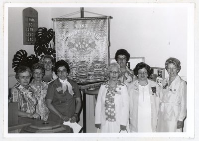 Photograph of Mrs. Gordon McGee, Mrs. Alex Rutherford, Miss Linda Caldwell, Mrs. Alec Glover, Mrs. Gordon McCulloch, Mrs. Dennis Moran, Mrs. C.H. Dallison and Mrs. Gordon Sherwin, 1978 Annual Meeting, Colborne W.I., Colborne Women's Institute Scrapbook