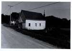 Photograph of Donald Bush's bee house, Castleton Women's Institute scrapbook