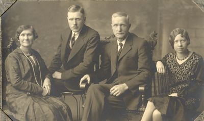 Studio portrait of Lena, Harold, John and Gertrude Coffee, Cramahe Township