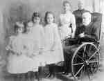 Judge Boswell with four granddaughters, his second wife and a nurse
