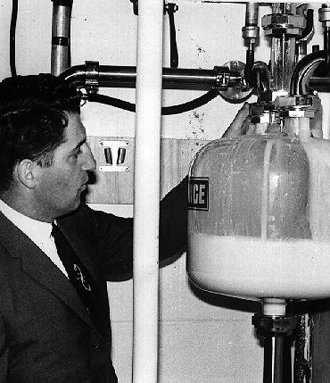 Howard Tarzwell Inspecting Milk Station.