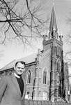 Rev G. Lockhart Royal stands in front of Norval Presbyterian Church.
