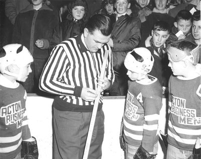 &quot;Rocket&quot; Richard autographs a Hockey Stick