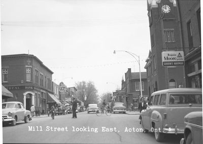 A Policeman Directs Traffic on Mill Street