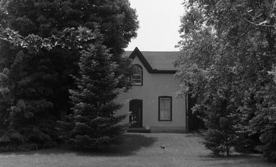 Scotch Block Stucco One and One-Half Storey Farmhouse