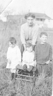 Mrs Mackie with her Three Children in a Field in Ashgrove