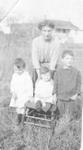 Mrs Mackie with her Three Children in a Field in Ashgrove
