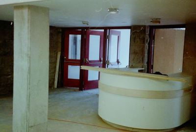 Halton Hills Cultural Centre - interior steel doors and welcome desk under construction.