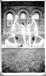 Marg Helson and friends demonstrate gymnastic routines in front of  Georgetown High School, 70 Guelph Street.
