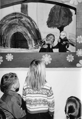 Georgetown Public Library - children watch a puppet show.