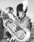 Fairgrounds Park - member of the Lorne Scots Regimental Brass Band plays the tuba.