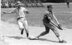 Steve Turner of the Georgetown Midgets Waits for the
Ball While Brampton Gets the Base.