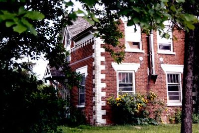 Red brick house at 15316 Ten Sideroad.