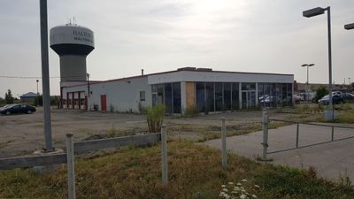 15 Mountainview Road North - empty car dealership.