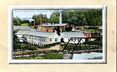 A view of the Barber Paper Mill with the River Road bridge in the  foreground.