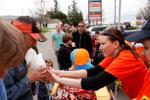 Amanda Holmes hands out goodies at M&M Meat Shop fundraiser.