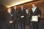 Masonic Lodge's Senior Warden Brother Tom Allen presents cheque to St. John's Ambulance members.