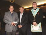 Senior Warden Brother Tom Allen presents cheque to Georgetown Hospital Foundation representitives.