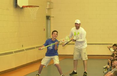 Colin Doyle at Holy Cross Catholic School with student Daniel Heelis.