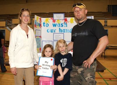 Gedge family checks out student work at McKenzie-Smith Bennett family education night