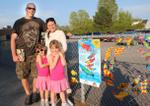 Alyssa and Madison Viozzi show parents art work at McKenzie-Smith Bennett family education night