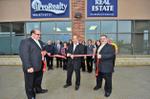 Ribbon cutting ceremony for iPro Realty Georgetown office's grand opening