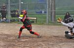 Sydnee Scott connects at the May Classic Girls' Fastpitch tournament