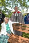 Jean Somerville sits on donated bench in honour of Limehouse Presbyterian Church's 150th anniversary