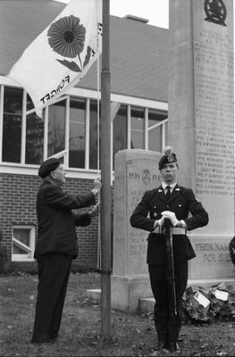 Lest We Forget flag at half-mast during Remembrance service