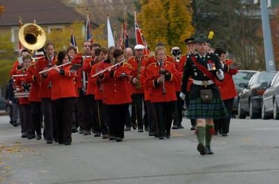 The Acton Citizens' Band plays while marching in the Remembrance Parade