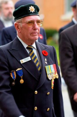 Frank Koen marches in the Remembrance Day Parade