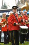 Acton Citizens’ bandmaster Dr. George Elliot plays the drum in Remembrance Parade